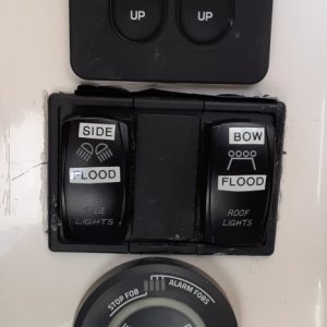 Trim tabs control and FELL switch controller at Helm