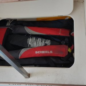 Life jacket storage under main table area