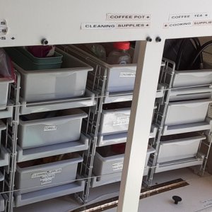 New multi-shelf and slider trays under Galley