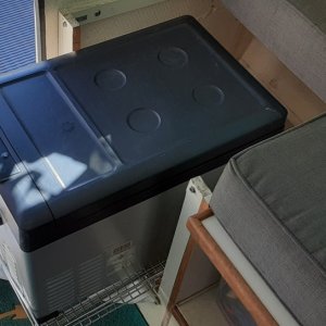 Electric fridge pulled out for use