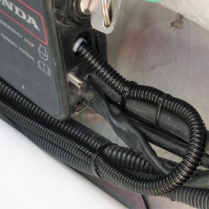 FELL system attaches to kill switch on the throttle assembly.  Instructions are easy to understand and product is easy DIY.
