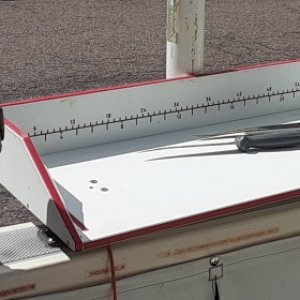 Removable fish cleaning station fits into rod holder mounts. Wash down pump is located to the left of this station.