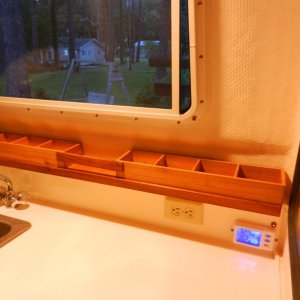 Galley shelf from some small drawer organizers, strip of plywood, and some teak trim.