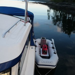 Media 'Look in my album folder "Fuel Supply System" and you will see a portable fuel line that I can quickly connect to the built in fuel tanks to pump fuel into the generator or the 2-hp Honda tender motor.' in album '1. I put this 1/4" sheet of plastic down to protect the bottom of the boat while the generator is running and give a more stable base for the 1000 watt Honda Generator to sit on and also protect the bottom of the boat.'