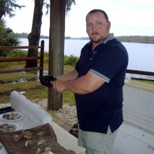 Service to the End
 Shucking Oysters