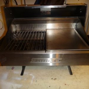 Media 'Added a griddle plate for pancakes eggs and such' in album 'New Spitfire grill. Will show on boat with Florida pics'
