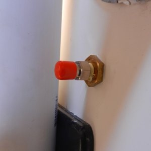 Close up of port.  I used a Honda outboard connector with 1/4" threads.  The cap is a plastic/rubber thing I had that just happened to fit.  It will surely degrade quickly and I'll have to find something else.
