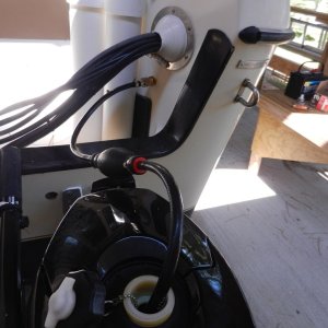 Media 'Here it is in use, refilling the dinghy outboard\'s internal tank.  Can also use it to fill the Honda EU generator easily!' in album 'Fuel port next to outboard cable exit with rubber dust cap'