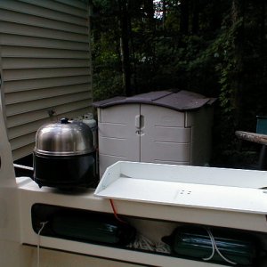 Mounted just behind cabin with Magma flush mounts.  Also mounted a Magma table next to BBQ.  Duplicated mounts on both port and starboard gunnels.