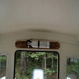 Fire extinquisher mounted above door