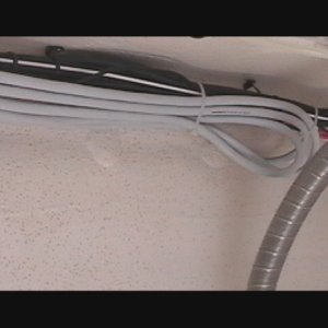 (Swee Pea) 
Routed wire wiretied to wiring harness under sink base.