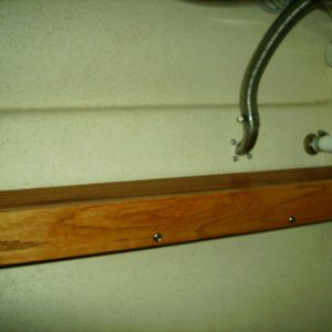 This view you can see shelf.  Adds storage to an otherwise useless space.