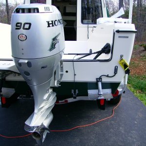 About to install a kicker mount.  We are using a 15" shaft 6 HP Nissan motor whose primary role is on our inflatable.  Emergency use on the 22 only.