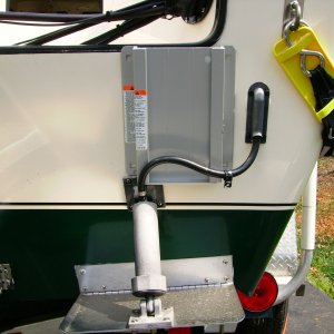 Must clear the trim tab.  Must not interfere witht the main.  Must tilt up.  This position is a little far to the starboard side, but with the kicker raised, will work.