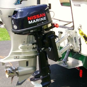 The Fulton motor mount slides into the mount bracket.  When not in use, we can remove the motor mount all together and keep the uncluttered look.