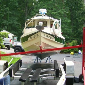 Using the G&G boat lift.  Attached to bow eye, lifted the boat off the trailer