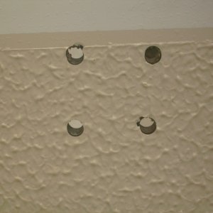Drilled holes in the factory floorboards to accomodate the Garhaurer Davit ball mount.