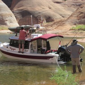 Jody unloading his Mokai. Jay standing by to assist. Oak Bay, Lake Powell