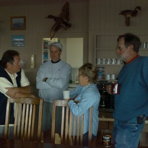 Serious town meeting...Jim (Wild Blue), Ron (Islander), Dixie and Brent (Discovery)
