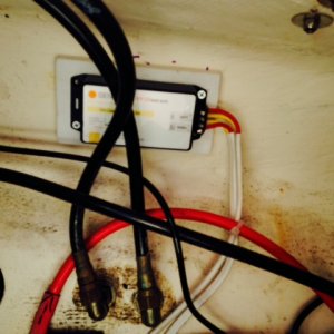 Genasun Mppt charge controller mounted on transom, near battery