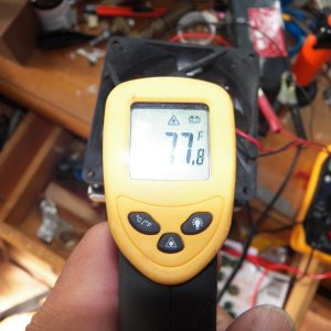 The "hot" air that passes the cooling fins is about 75-77 degrees.  The fan is .27 amps and moves a lot of air.  I tried a quieter fan, but it didn't cool the hot side of the TEC as effectively, which is the key to getting the maximum cooling efficiency from a TEC.