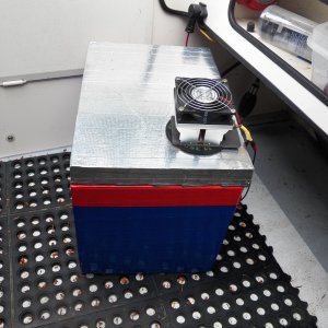 I wrapped some duct tape around the foam box for a little abrasion protection (I used up a couple of partial rolls, hence the multi-colored box).  The TEC unit sits in a hole cut in the lid.