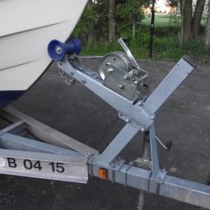 Media 'Notice bow stop configuration where it sits on main frame. Need to shim and make adjustments to move bow stop rearward.' in album 'Notice boat sitting too far forward on trailer bunk'