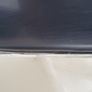 Slight delamination of the forward edge of the transom