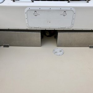 Fuels tanks exposed with snaps placed where screws in trim is.