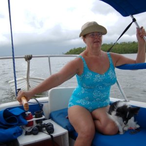 Judy at the helm with Parate hat.