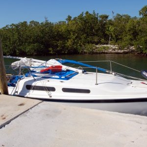 DisMasted "Papillon II" at Marathon Boat Works dock