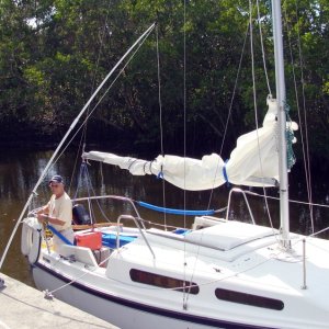 Putting everything back on the boat after rerigging.