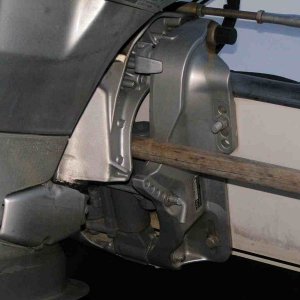 Engine resting on dowel in down traveling position