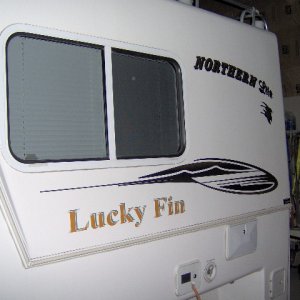 Media 'No sense letting the lettering go to waste' in album 'Northern Lite, Much smaller and lighter. But was next to impossible to get into it pulling the boat.'