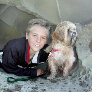 Bryce and Oscar in a Sandstone Cave Galiano Island 6-25-04