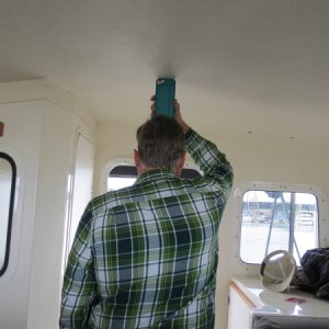 Cabin Height - I am 6' 2".  This shows the extra room above my head (with an iphone).