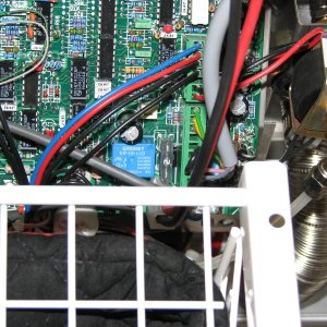 Media 'The circuit board with the fuse is facing out towards the open door. Almost like they planned on changing the fuse at some point.' in album 'You can see the 2 amp fuse here. Just off center to lower right with the 2 on it.'