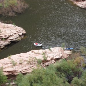 Jim in Dinghy from Defiance House at Forgotten Canyon 9-15-09.Sized