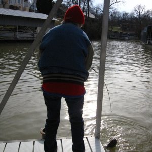 Cathy catching Catfish Hunter