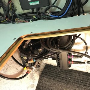 View of Smart pump with all hydraulic and electric lines installed.  Slack of electric lines was coiled up and set on top of pump.