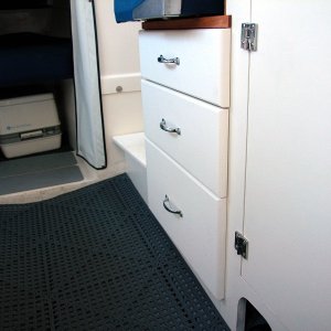 (AnchortownJim) The drawers I built to fill the void from the removed ice box.  The fronts are made out of 3/4" Starboard.