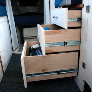 (AnchortownJim) The drawers have full extension slides.