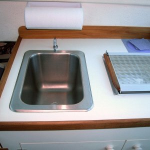 (AnchortownJim) Paper towel holder held up with industrial strength double sided foam tape.