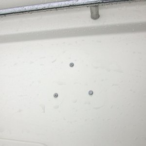 Media 'Light mounting ring screwed to overhead through the fiberglass as there was not a core to put screws into.' in album '(AnchortownJim) Quick ASTER 500 mounting plate made out of 3/16" 6061 aluminum, prior to being epoxied to the deck with MarineTex, side view.'