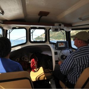 This great photo taken by Les Lampman on our maiden voyage shows the ample space in the cabin of this boat.  Moving up to the Marinaut 215 from our CD 16 Cruiser made a HUGE difference for us in comfort and elbow room.  9/26/12 update -- One thing important that can go overlooked is that the cabin walls go straight up, instead of angling in toward the center.  This visually creates a lot of space, and makes us feel we are in a much larger boat.  Indeed, over the course of a year, we spent over 30 nights on the Betty Ann, and we continue to feel we are in a very comfortable and unconfining living space.
