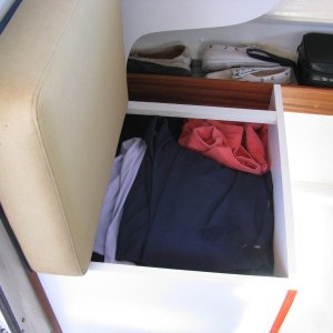 Rear Port Storage Box, which can easily hold the contents of a large suitcase.