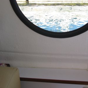 A very convenient shelf attached to the port, dinette wall
