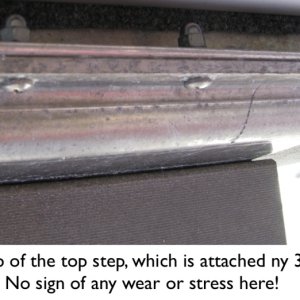 Media 'After a full season: attachment of top step to fuel tank via 3 bolts.' in album 'The cabin, shown with the bulkhead removed in Les' photo on Facebook, in our view is quite large.  One could argue that it is really 7' 7" long, and the 5' 9" berth extends out 18" into the cabin, which allows a person to sit on the berth while visiting with three other people in the cabin, as well as allowing easy access to the portable toilet under the center cushion.  Of course, when the left, rear cushions are put into place, the berth extends to a total length of 7', reducing the floor space in the cabin at night.  Visually however, the cabin still looks 7' 7"' long.  That's the genius of this design.  Please notice, too, the width of the floor in front of the dinette and galley:  it is wide enough for two people to easily pass one another, which we feel is an important feature for living comfortably in a small boat.'
