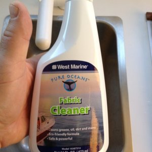We found this product at West Marine that works great on Sunbrella to remove stains.  We have light-colored fabric, so this was an important find.