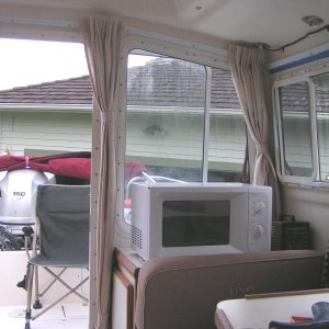(Pat Anderson) Aft Window and Door Draperies, tied back.
